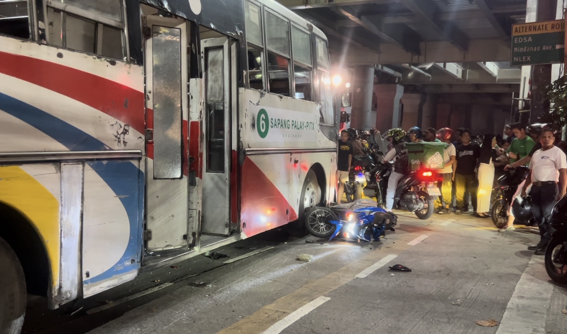 A passenger bus figured in a road accident with a UV Express, six motorcycles, and a taxi on Monday night, April 30, 2024. INQUIRER.net/ Faith Argosino