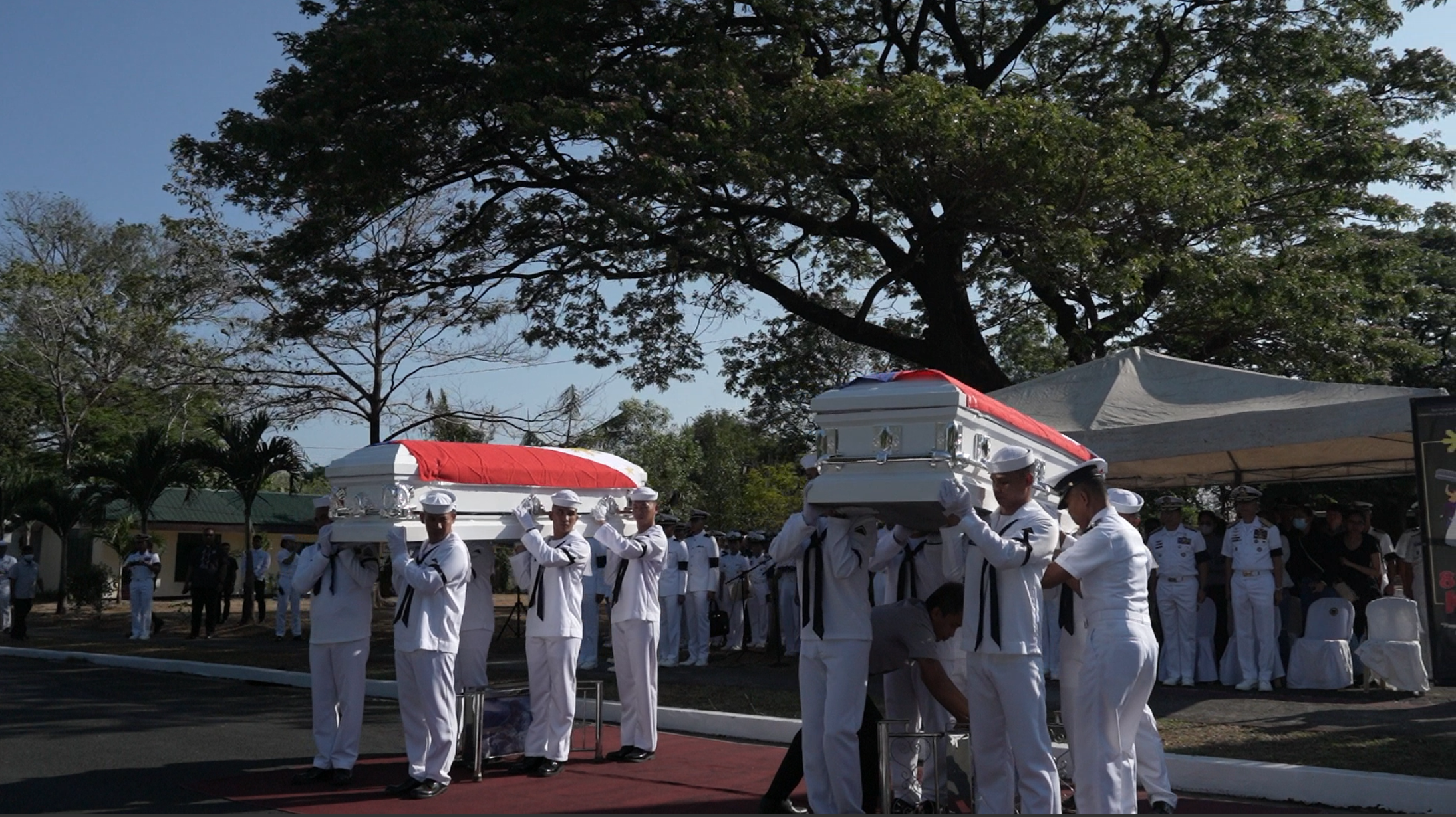The Philippine Navy renders arrival honors to its two pilots who tragically lost their lives in a helicopter crash, before they are laid to rest at the Libingan ng mga Bayani in Taguig City. (Screengrab from Naval Public Affairs Office video)
