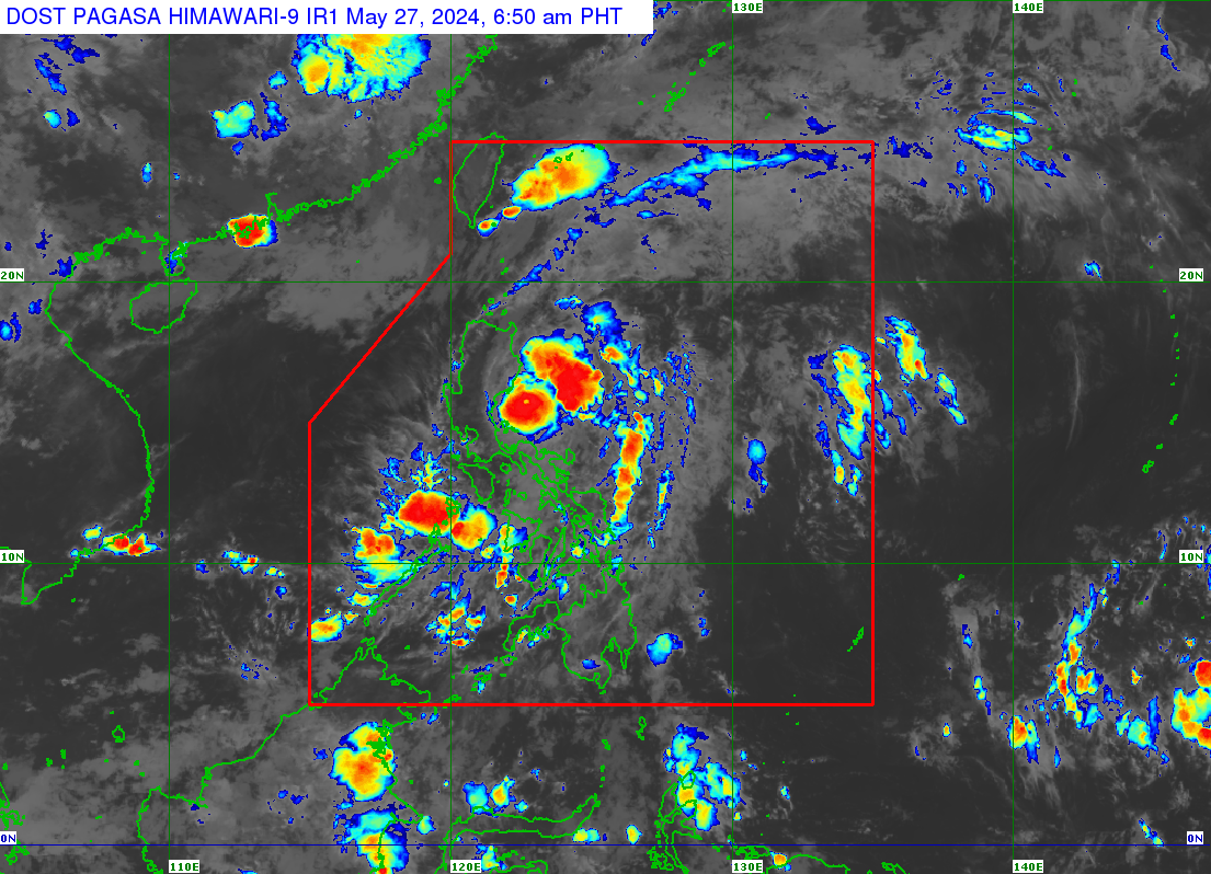 : Typhoon Aghon (international name: Ewiniar) slightly intensifies over the Philippine Sea, with Signal No. 2 still raised over three Luzon areas on Monday morning, May 27. | Satellite photo from Pagasa