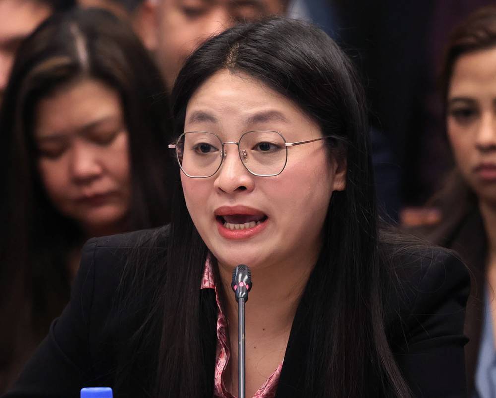 May 22 2024Bamban Tarlac Mayor Alice Guo appears before the Senate as Sen. Risa Hontiveros flagged Guo's alleged ties to chinese "criminals" during wednesday's continuation of the senate probe into the mayor's links to POGO hubs in the latter's area. INQUIRER/ MARIANNE BERMUDEZ