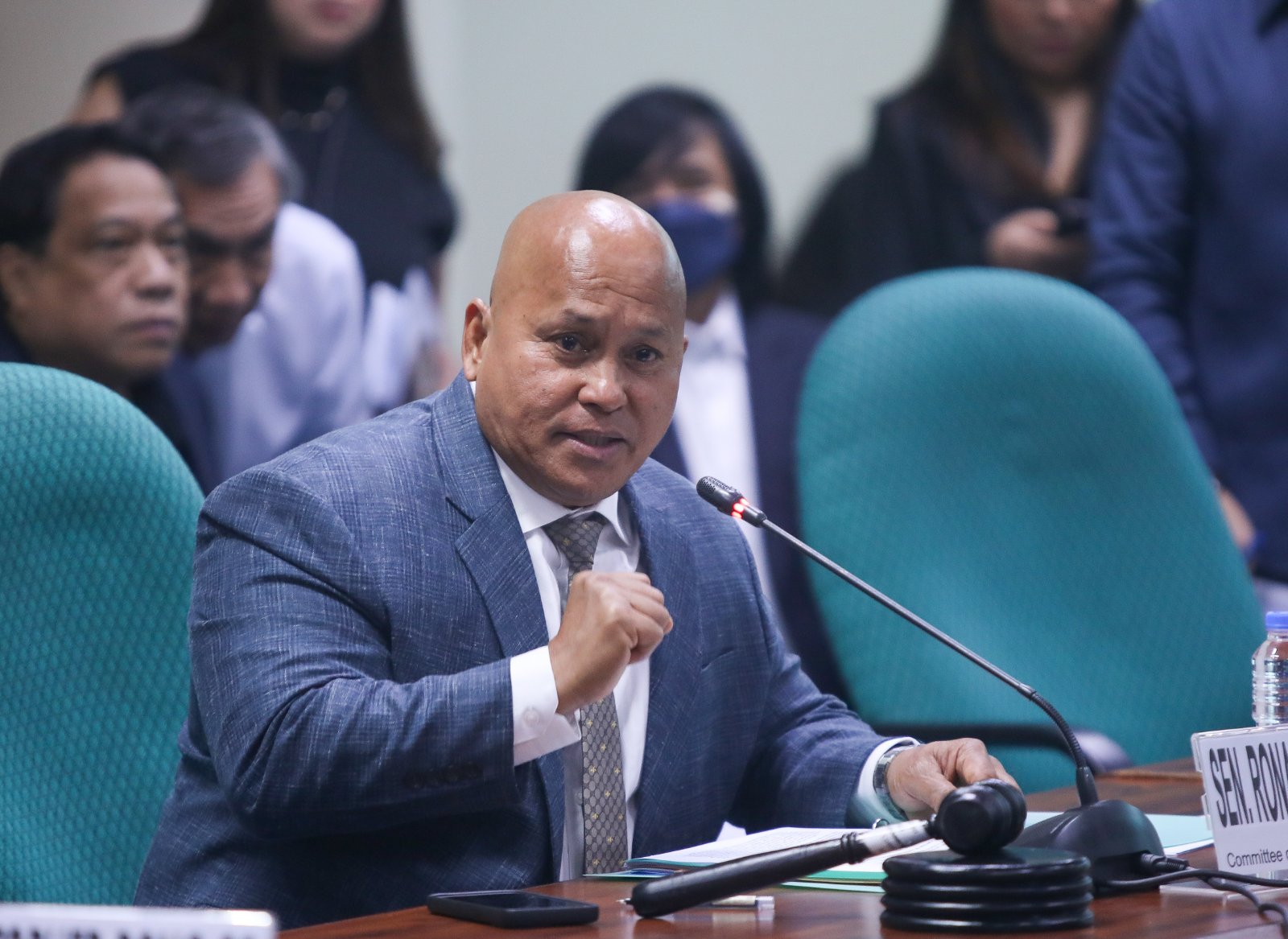 A fuming Senator Ronald "Bato" dela Rosa couldn't help but glare at Antonio Trillanes IV on Tuesday, daring the former senator to personally handcuff him should the ICC begin issuing arrest warrants.