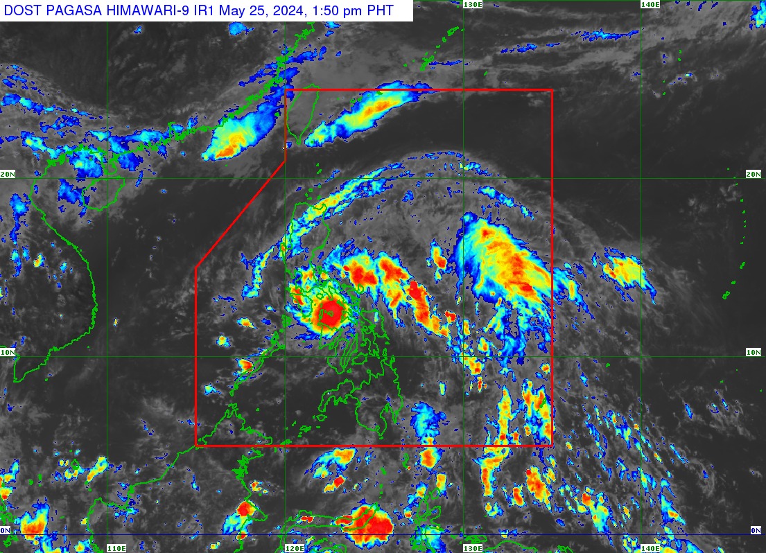 The state weather bureau said Tropical Depression Aghon slightly weakened as it crossed Ticao Island and Masbate City.