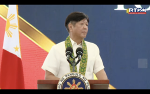 President Ferdinand Marcos Jr. delivers a speech at an aid distribution event in Surigao del Sur on June 20, 2024. Photo from RTV Malacañang.