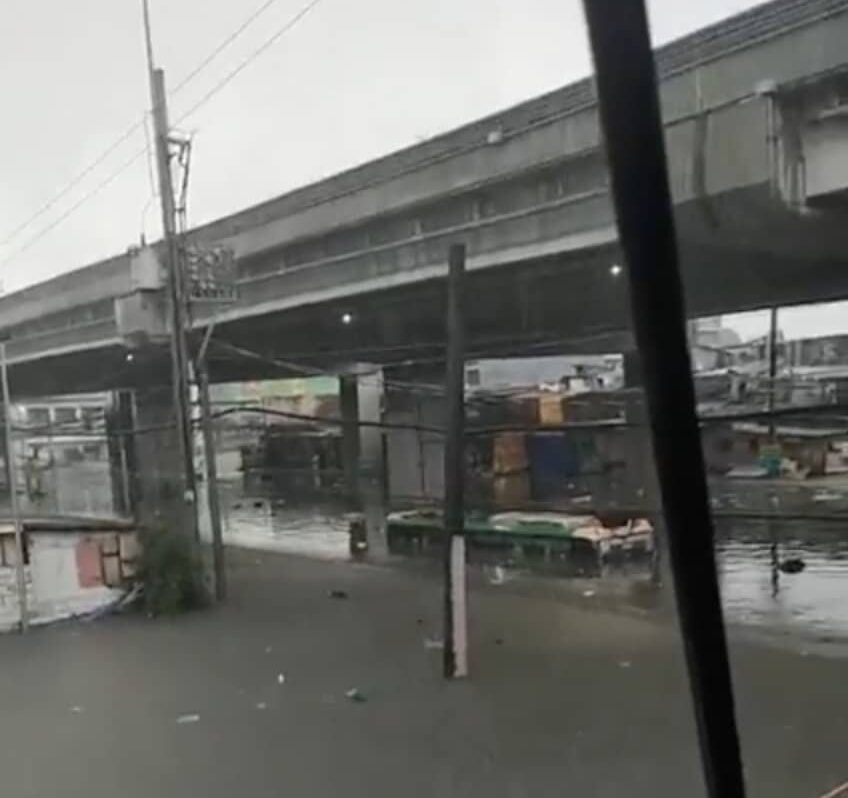 A bus on Araneta Avenue in Quezon City was submerged in flood waters.