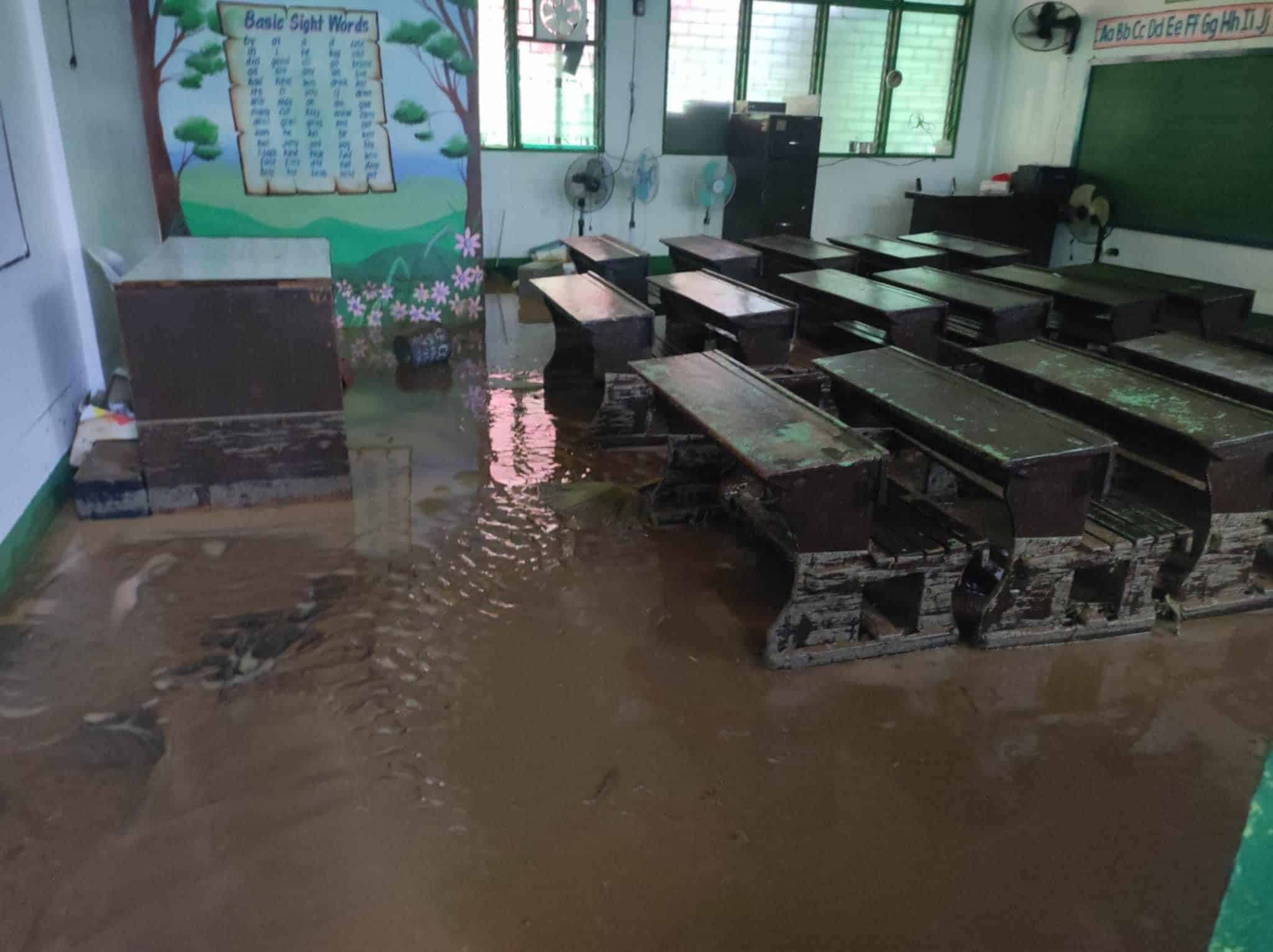 Massive flooding drenched school equipment inside classrooms in Sergia Soriano Esteban Integrated School in Barangay Kalaklan in Olongapo City.