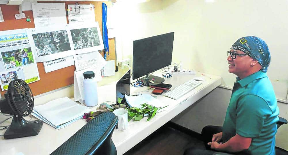 Baguio Midland Courier editor Harley Palangchao,one of the protégés of former publisher Charles Hamada, puts to bed the final edition of Baguio’s oldest newspaper.