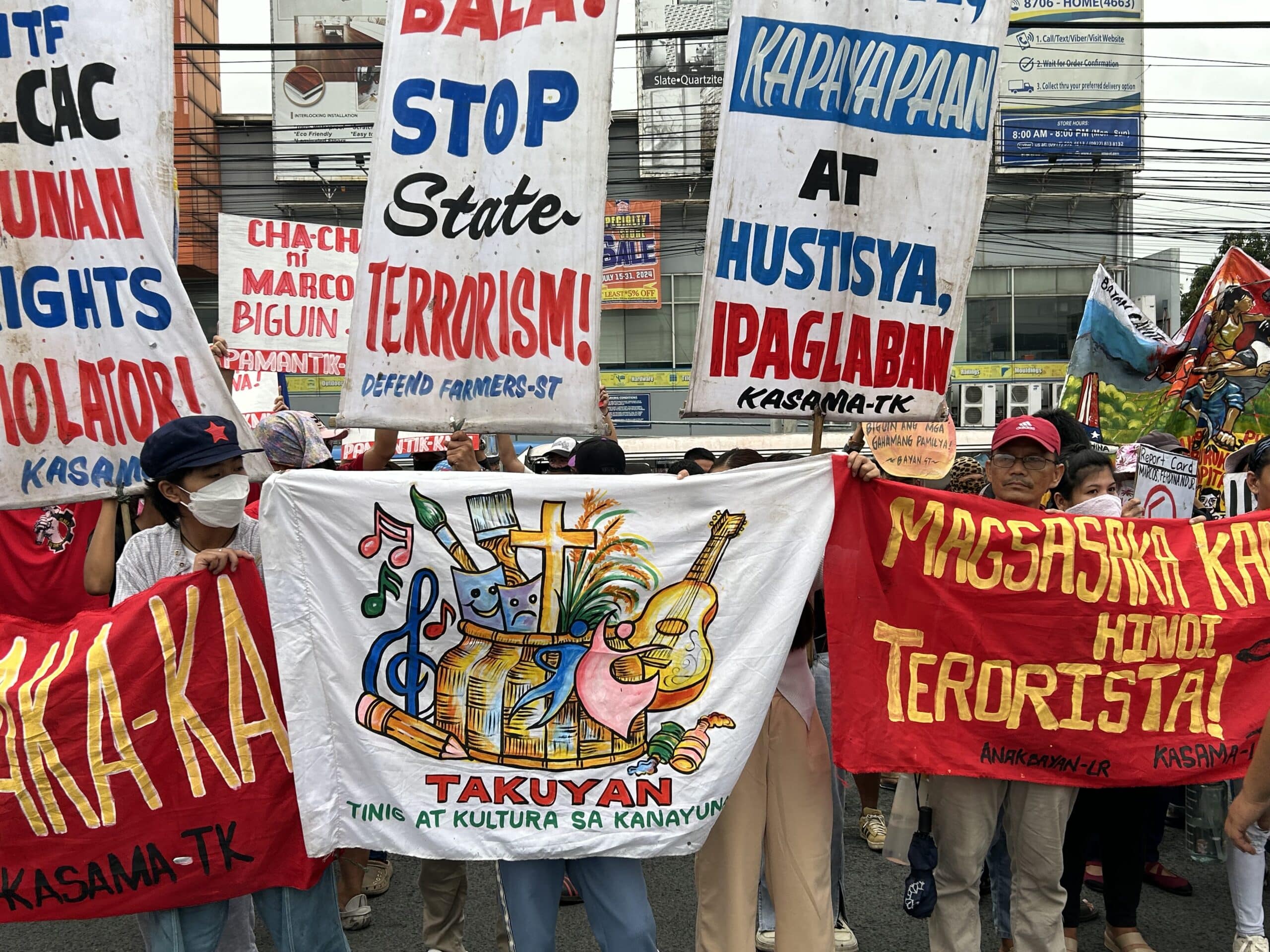 Protesters gather along Commonwealth ahead of Marcos' 3rd Sona
