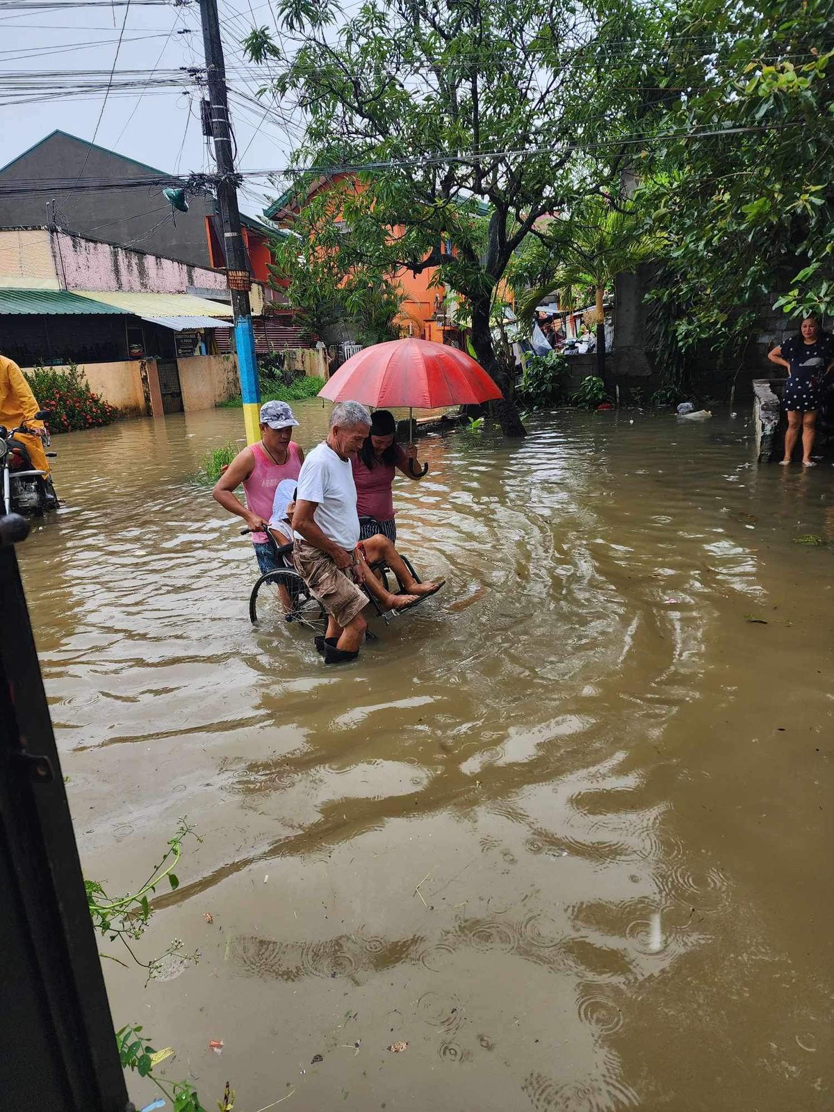 Situation at Magdalena in Balagtas, Bulacan as of 1:30 p.m. on Wednesday, July 24, with floods caused by heavy rains brought by Typhoon Carina and the southwest monsoon.