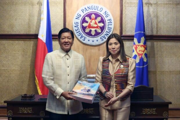 President Ferdinand R. Marcos Jr. receives a copy of the National  Expenditure Program 2025 from Budget Secretary Amenah Pangandaman at the Malacañan Palace on Wednesday, July 31, 2024. (KJ ROSALES/PPA POOL)