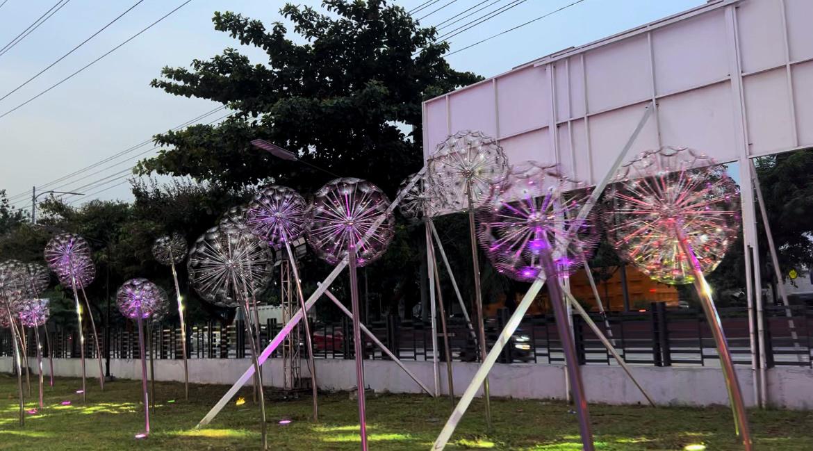 Life-size, colorful "dandelion" light installations