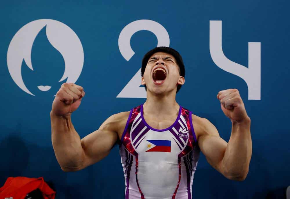 Paris 2024 Olympics - Artistic Gymnastics - Men's Floor Exercise Final - Bercy Arena, Paris, France - August 03, 2024. Carlos Edriel Yulo of Philippines celebrates after his performance.