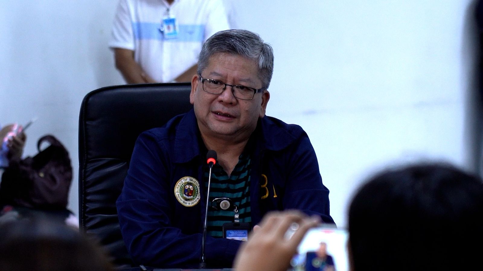 Bureau of Immigration Norman Tansingco talks to members of the media during a press conference with officials of the Department of Justice and National Bureau of Investigation (NBI) at the NBI-BSD office on Araneta Avenue in Quezon City on Friday, August 23, 2024. Arnel Tacson, INQUIRER.net