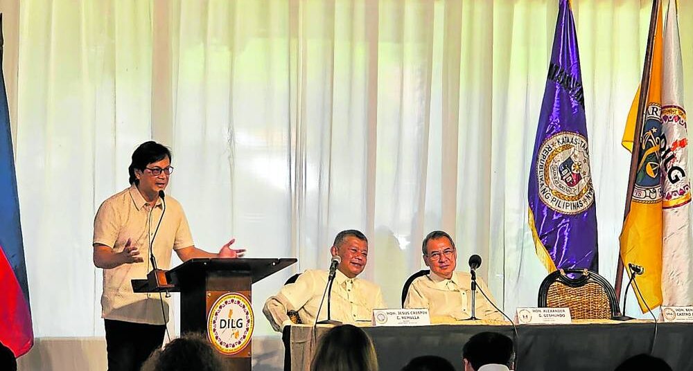 Interior Secretary Benhur Abalos (left) in a program on Tuesday in Cagayan de Oro City explains the benefits of reliable data in the country’s penal system as Justice Secretary Jesus Crispin Remulla (center) and Chief Justice Alexander Gesmundo listen.