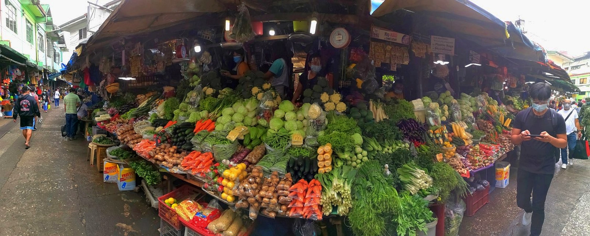 SIMPLE ABUNDANCE Baguio residents and tourists enjoyed cheaper vegetables and other food items in August compared to the previous months this year, the Philippine Statistics Authoritysays in a report. This section of the Baguio public market, shown here in 2022, has been a crowd drawer for salad greens that cost a lot less than those sold in supermarkets. 