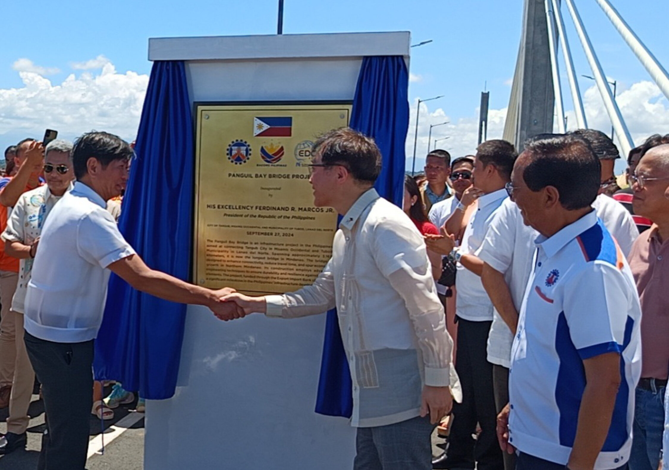 President Marcos greets Korean Ambassador to the Philippines Lee Sang-hwa as he unveils a marker of the Panguil Bay Bridge on Friday. This important infrastructure project in Mindanao was finished through the assistance of the Korean government.