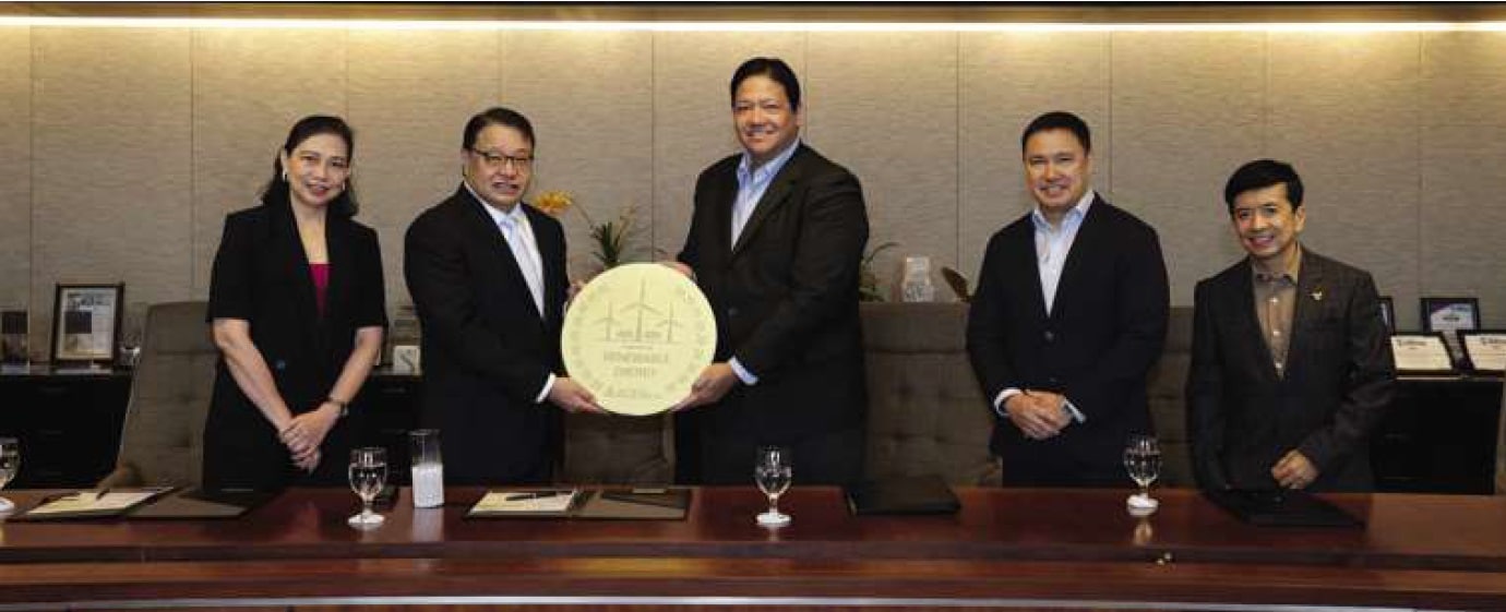 ACEN president & CEO Eric Francia (center) turned over the “Powered by Renewable Energy” badge toATYC Inc. president & CEO Lorenzo Tan (second from left) in recognition of the company’s commitment to renewable energy. Also present during the signing ceremony were ATYC Inc. COO & CFO Gema Cheng (leftmost), ACEN managing director & COO for Philippine operations Miguel de Jesus (second from right) and ACEN SVP for market transformation Tony Valdez (rightmost).