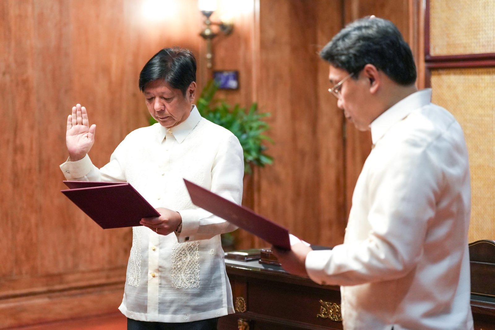 Cesar Chavez takes his oath as press secretary at Malacanang Palace on Thursday. (PCO photo)