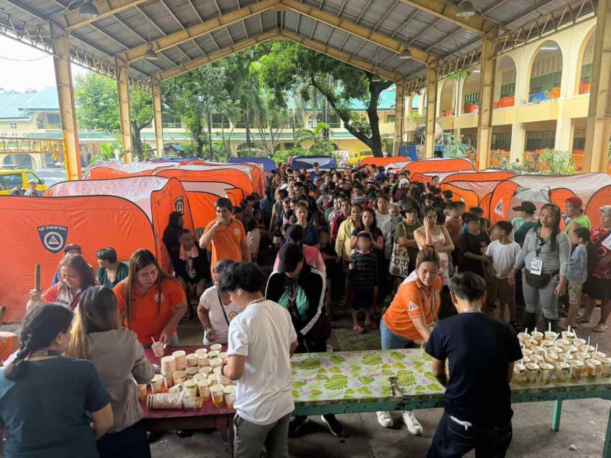 Social workers assisting QCitizens who are temporarily staying in evacuation sites due to the impact of Severe Tropical Storm Kristine. Photo from Quezon City Government's Facebook page.