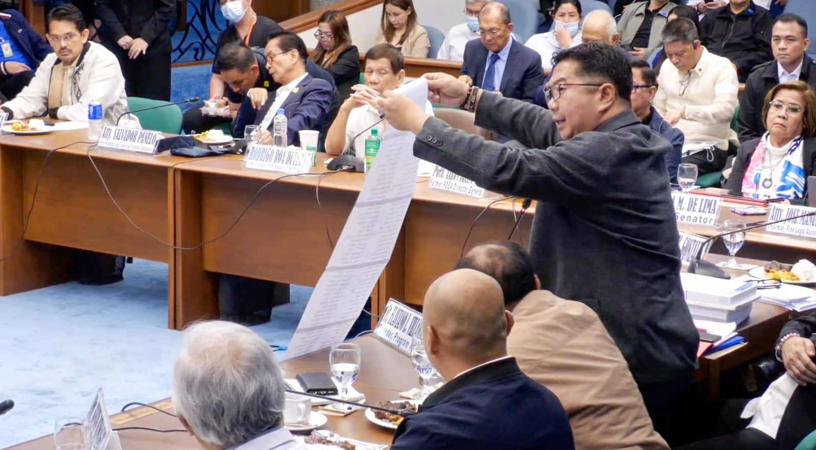 A few days after engaging in a verbal tiff with a senator during Senate hearing on former President Rodrigo Duterte’s bloody drug war, Catholic priest Flaviano “Flavie” Villanueva was in a more solemn mood Thursday as he led a blessing ceremony in a shrine built in remembrance for its victims.