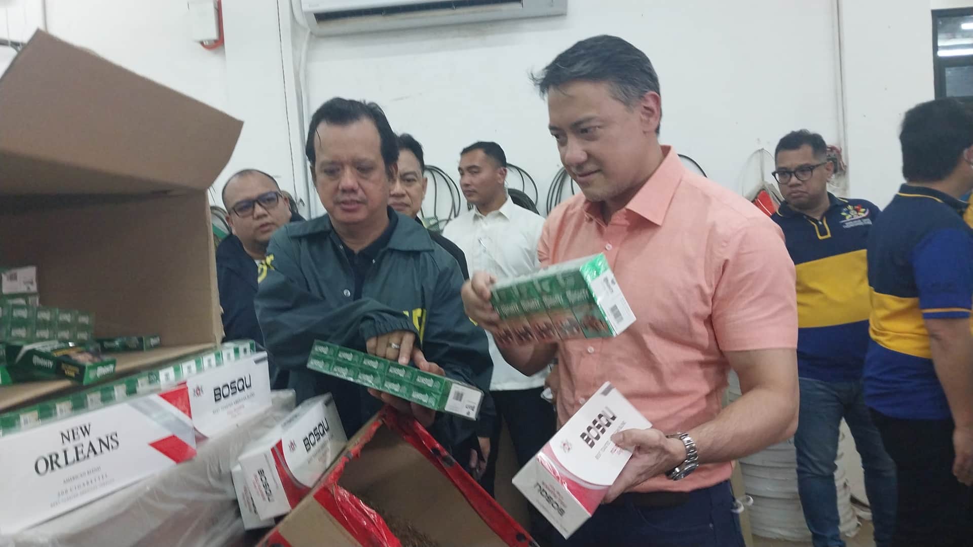 ECONOMIC SABOTAGE Bureau of Internal Revenue Chief RomeoLumagui Jr. leads the raid on a clandestine cigarette factory in Cabanatuan City on Thursday that resulted in the seizure of hundreds of cases of fake tobacco products and the arrest of 15 Chinese and 100 Filipino workers. 