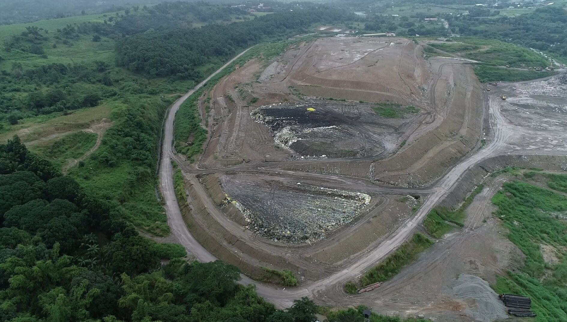 VITAL DUMP A drone shot on Oct. 14 shows the sanitary landfill of the Metro Clark Waste Management Corporation’s 100-hectare waste management facility at Sitio Kalangitan in Capas, Tarlac. The facility serves businesses and local governments in central and north Luzon.