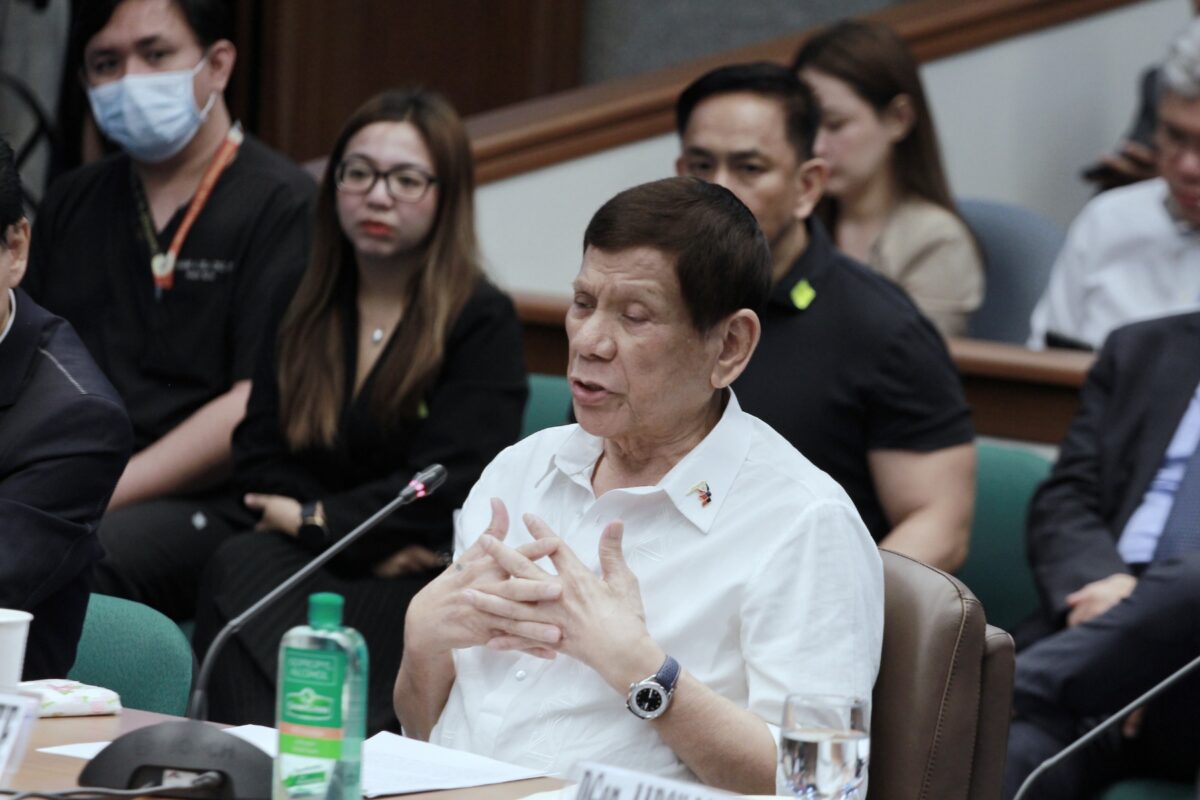 The Senate Blue Ribbon Committee secretary administers the oath of former President Rodrigo Roa Duterte on Monday, October 28, 2024 before he begins his testimony before the subcommittee investigating motu proprio the alleged extra-judicial killings during his administration. In his opening statement, Duterte defended his war against illegal drugs, which he said was not about killing people but about protecting the innocent. 