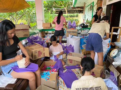 San Isidro Youth Organization repacks relief goods in Camarines Sur.