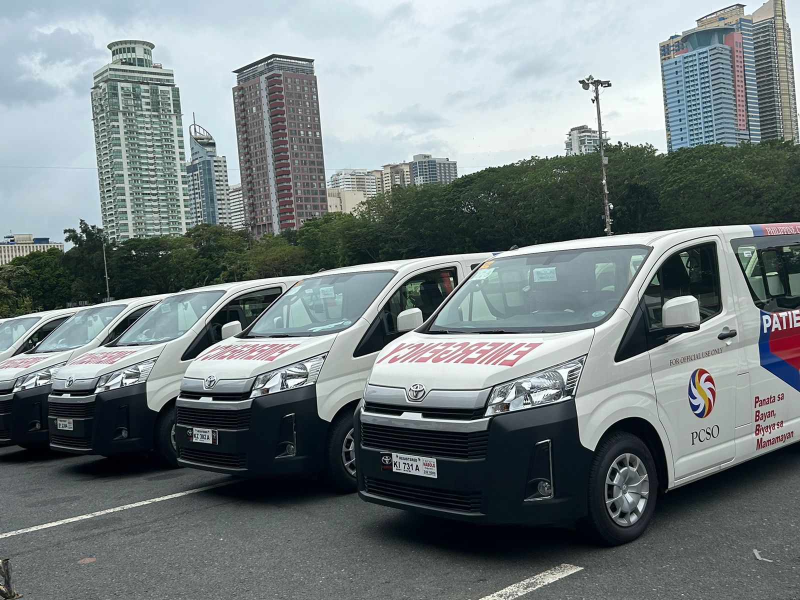 

A priest blesses the 90 patient transport vehicles (PTVs) to be sent to Cebu, Bohol, Pangasinan, Negros Occidental, Northern Samar, and Rizal in a ceremonial turnover on Wednesday, October 30, 2024. (Photo courtesy of Luisa Cabato|INQUIRER.net)