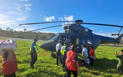 A W-3A "Sokol" helicopter of the Philippine Air Force helps transport relief supplies and social welfare personnel during its second deployment to Itbayat, Batanes on Wednesday (Oct. 9, 2024). The Air Force said this is part of the government's relief efforts to aid the typhoon-hit province. (Photo courtesy of the PAF)