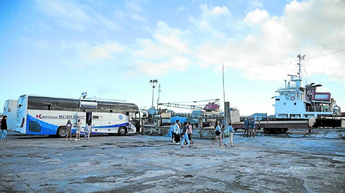 HELP IS ON ITS WAY The aid initiative of Sorsogon for typhoon-hit Catanduanes include sending its mobile clinics to the province, shown here on Tuesday, which are waiting to be loaded to a ferry that will transport them from the Tabaco City port in Albay to the island.