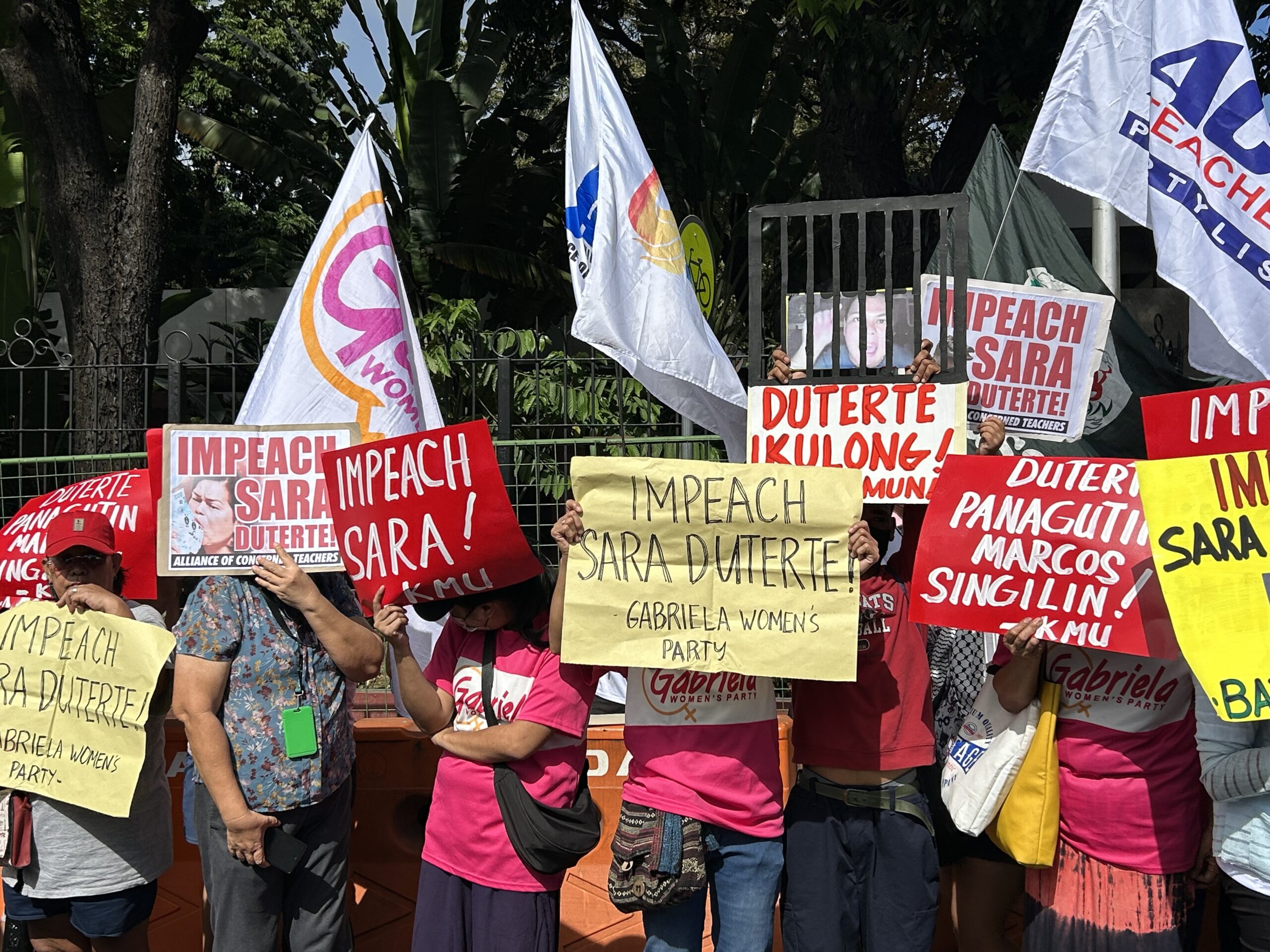  Members of Makabayan Coalition holds a protest on November 25, 2024, calling for the impeachment of Vice President Sara Duterte in front of the House of Representatives south gate. INQUIRER.net / Faith Argosino 