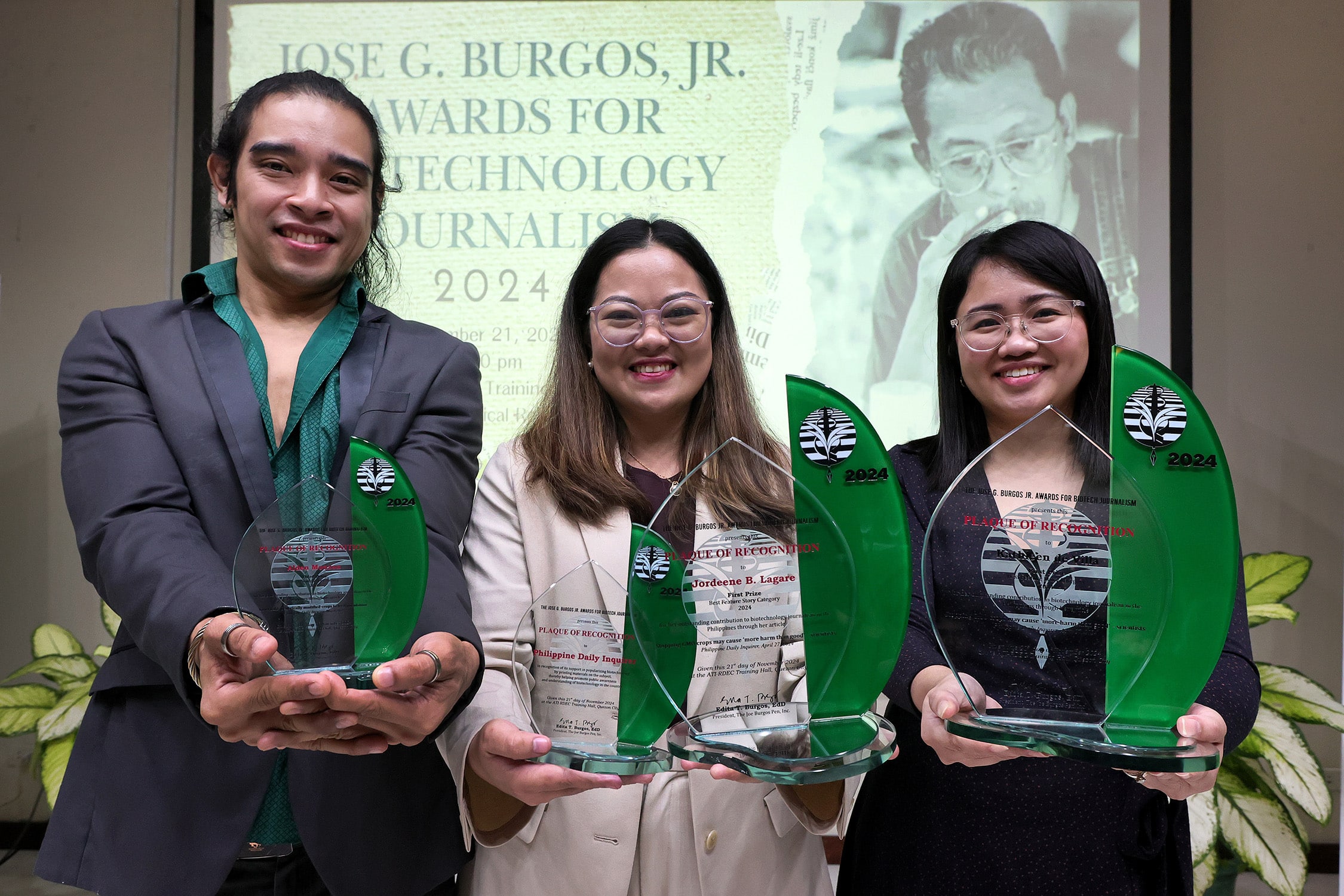 RECOGNITIONS (L-R) AldenMonzon, Jordeene Lagare and Kathleen de Villa receive their trophies after winning in the 2024 JoseG. Burgos Biotech JournalismAward in this photo taken on Nov. 21. 