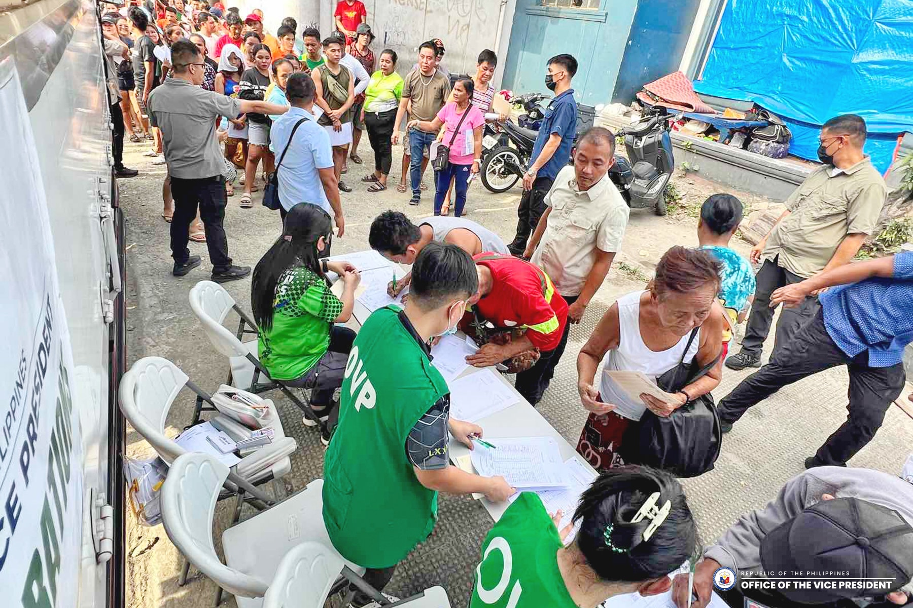 ‘AYUDA’ WORK GOES ON Amid the new controversies hounding its head, the Office of the Vice President (OVP) got busypreparing relief goods for victims of the massive fire that destroyed parts of the coastal slum community of Isla Puting Bato in Manila on Nov. 24. Photo released by the OVP through its Facebook page on Wednesday.