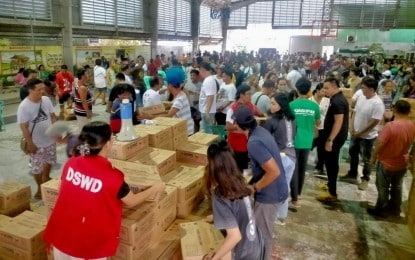 RELIEF EFFORTS. The Department of Social Welfare and Development distributes family food packs to disaster-affected residents in Dagupan City, Pangasinan on Wednesday (Oct. 30, 2024). As of Sunday (Nov. 3), the government has already released aid amounting to PHP1.1 billion. (Photo courtesy of DSWD-Ilocos)