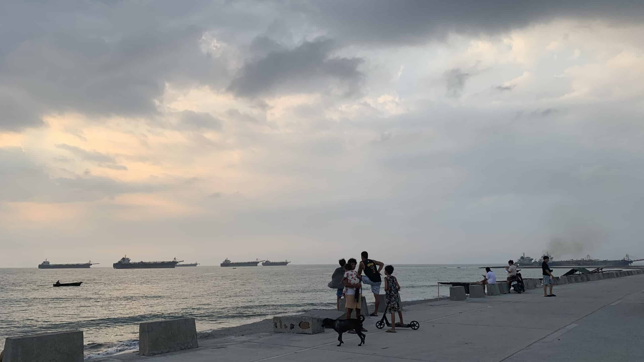 WATERWAY CLEARING Vessels manned by Chinese crew members are seen off San Felipe town in Zambales province in this photo taken in May, before the provincial government suspendeddredging operations in Maloma River. 