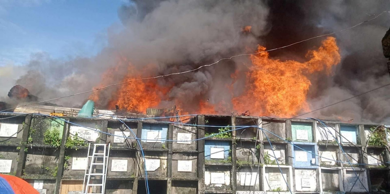 Fire hits 'apartment tombs' at Bagbag Cemetery in QC