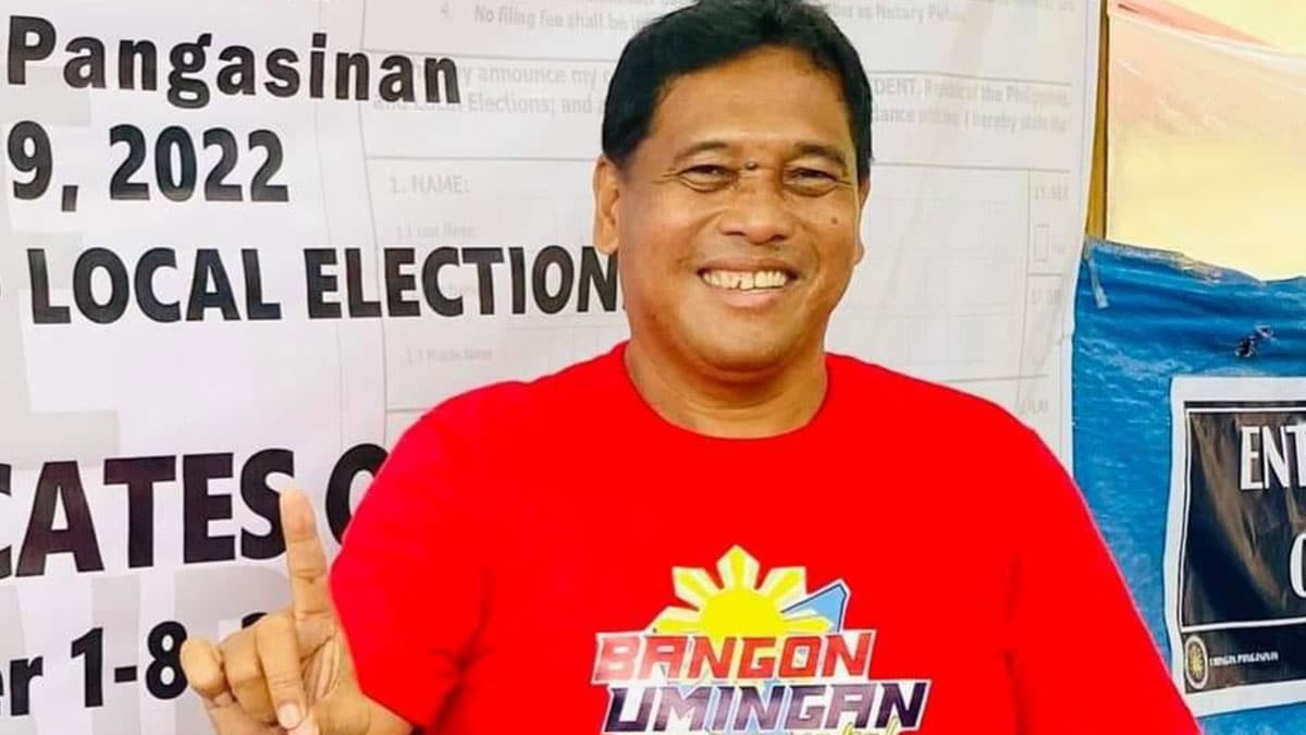 A LIFE TAKEN Ponciano OniaJr. smiles broadly as he shows a copy of his certificate of candidacy for reelection as councilor of Umingan, Pangasinan, which he filed in October. Onia, who is also the president of Abono Partylist, was killed on Saturday. —PONCIANO ONIAFACEBOOK