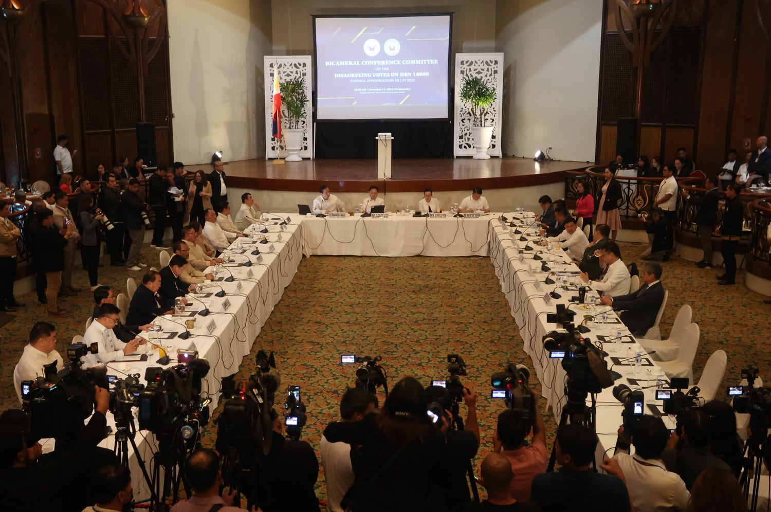 The bicameral conference committee onthe draft 2025 national budget meets at The Manila Hotel on Wednesday, where lawmakers later approved the P6.252-trillion purse of the Marcos administration in a midterm election year.