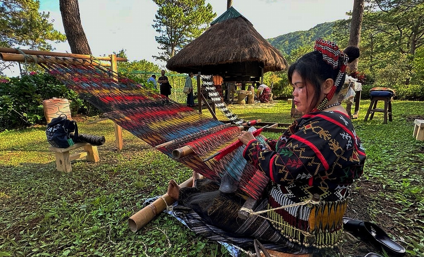 TRADITIONAL CRAFT A Tboli weaver showcases her craft at Winaca Village in Tublay, Benguet, as part of activities for the World Ikat Textiles Symposium held in Baguio City early this month.