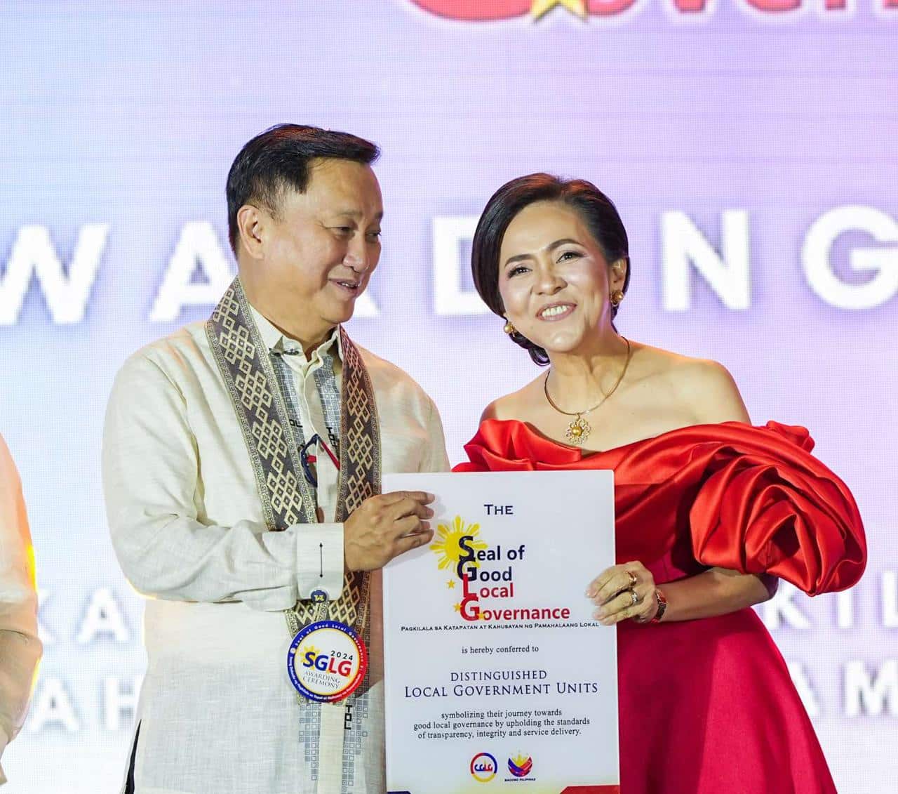 SGLG Awards - senate Majority Leaeder Francis Tolentino( second fromLeft) poses with Quezon Governor Helen Tan who was one of awardees as the Senator stressed the culture of innovation and transparency among local government units.