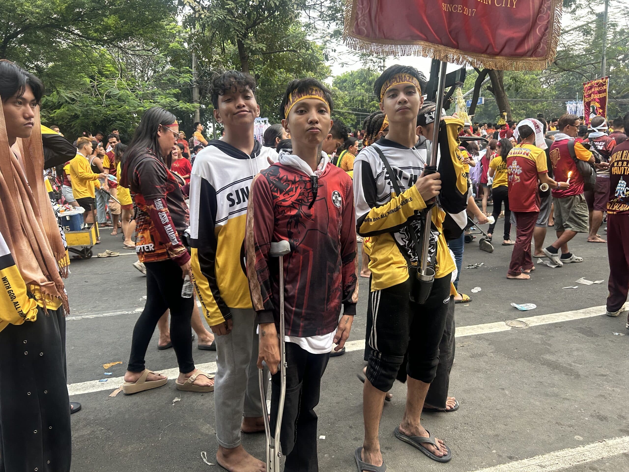 Christian Garcia, a 21-year-old Nazareno devotee, joins this year’s Traslacion with his friends. (Photo by Dianne Sampang/INQUIRER.net)