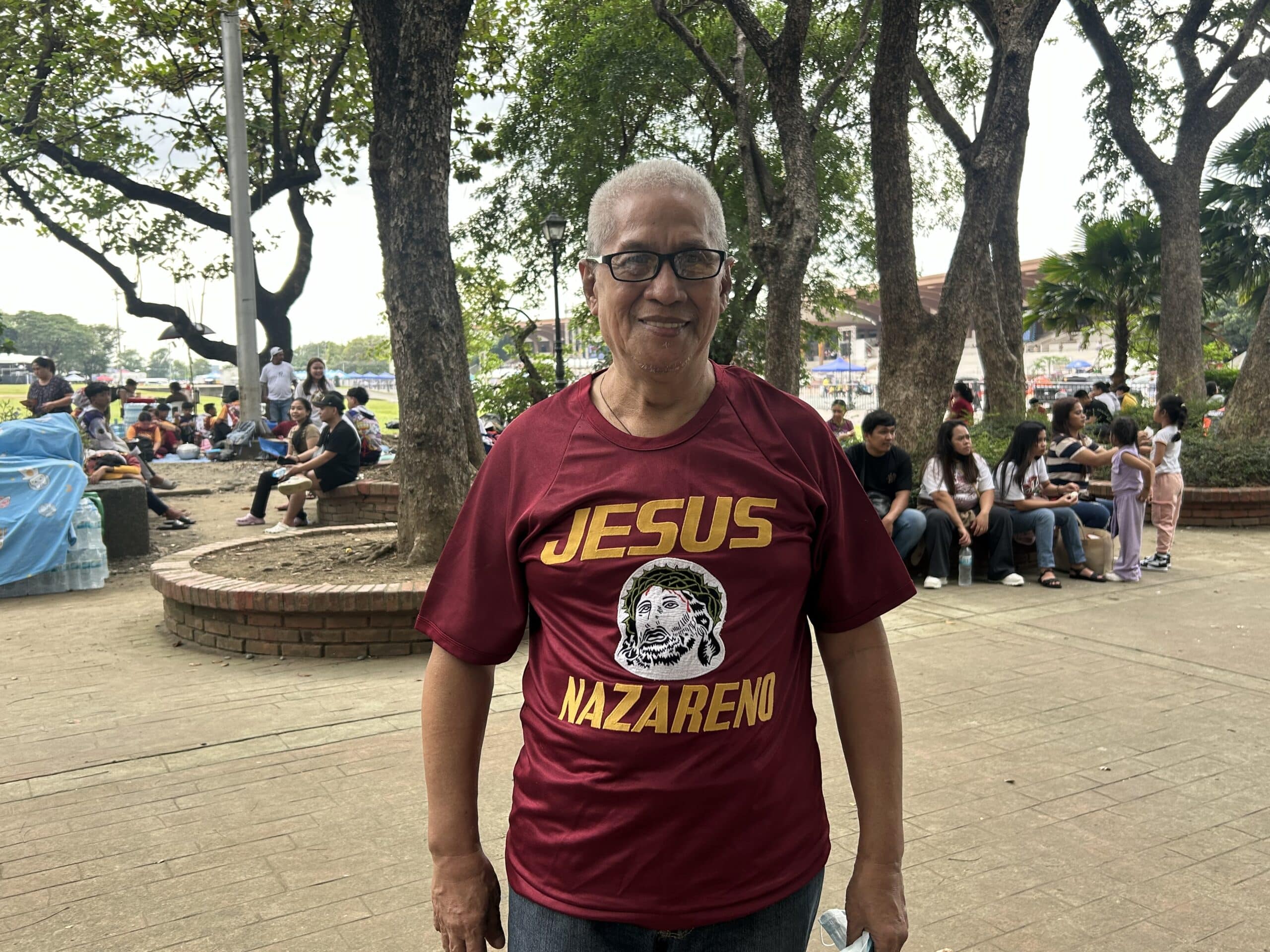 Devotee Odelino Faraon, 69, shares that he has had his maroon Nazareno shirt for 35 years. (Photo from Dianne Sampang/INQUIRER.net)