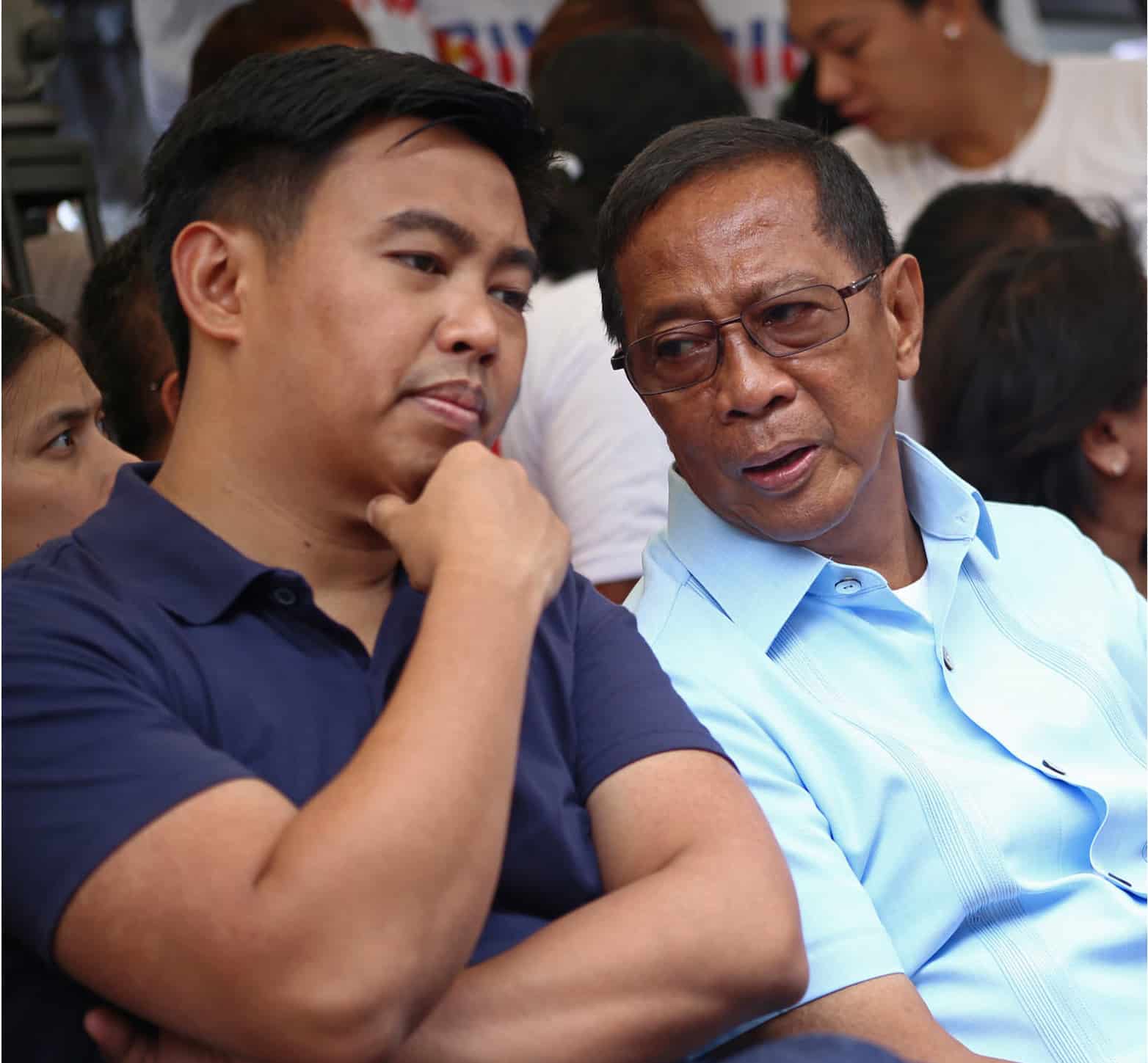 VINDICATED Former Vice President Jojo Binay and son Junjun,shown chatting in this photo taken onAug. 20, 2015, are cleared by the antigraft court of several charges relating to the construction of theMakati Science High School building. 