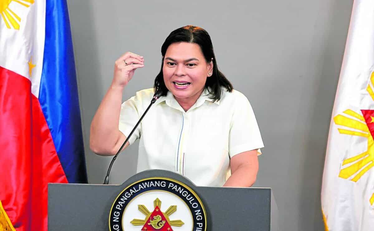 Vice President Sara Duterte gestures while speaking before a press conference