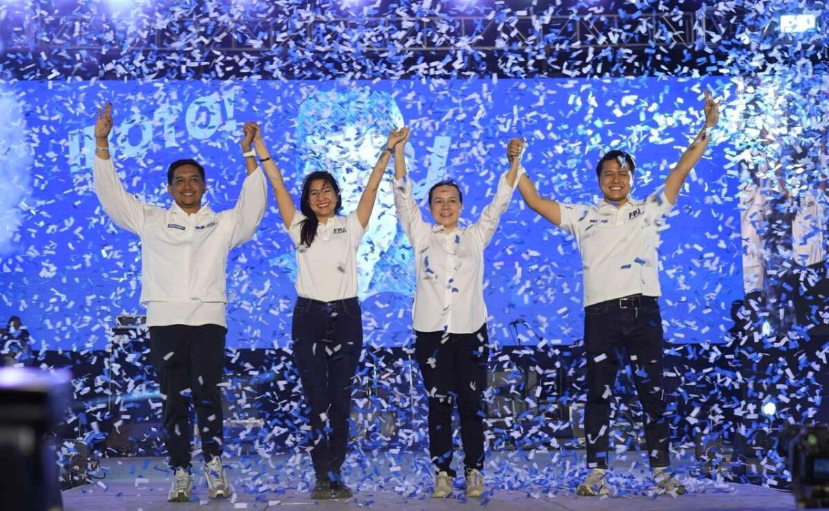 Left to Right: Mark Patron, Hiyas Dolor, Senator Grace Poe, and Brian Poe raise hands at Lemery, Batangas