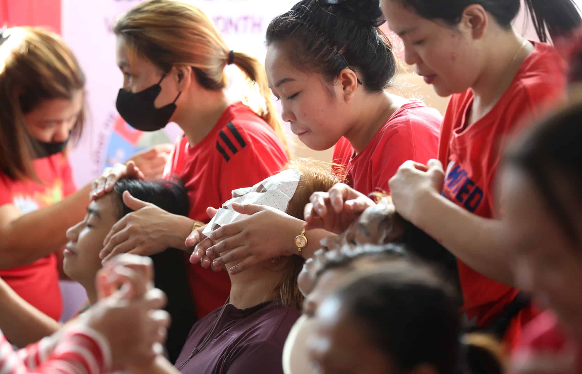 TIME FOR SOME PAMPERING San Juan City marks National Women’s Month with some activities organized by the local government on Friday, like free health-careservices, legal consultations and—in the case of these ladies—a well-deserved “wellness” session.