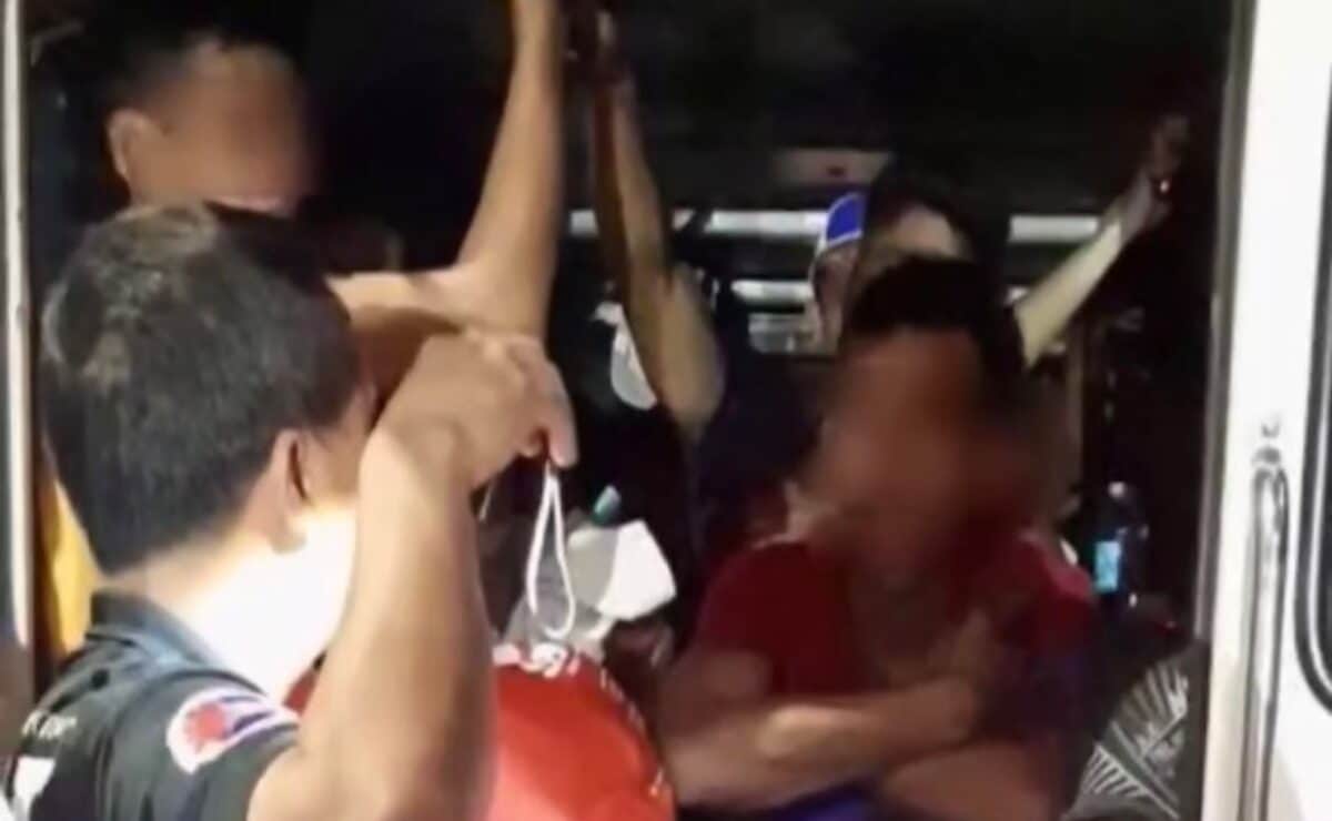 Transport authorities stop an unregistered or “colorum” van along Aurora Boulevard in Cubao, Quezon City for overloading passengers on Thursday late evening, April 17, 2025