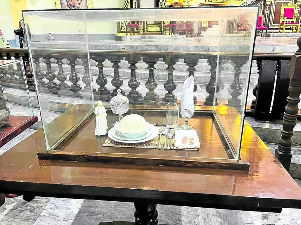The skull cap and utensils used during the Pope’s visit toLeyte, where Jenita Aguilar and Cecile Acebedo met the Pontiff. 