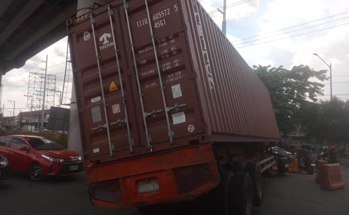 A trailer truck is stalled at a U-turn slot along Marcos Highway on May 2, 2025. — Photo from Metropolitan Manila Development Authority/Facebook