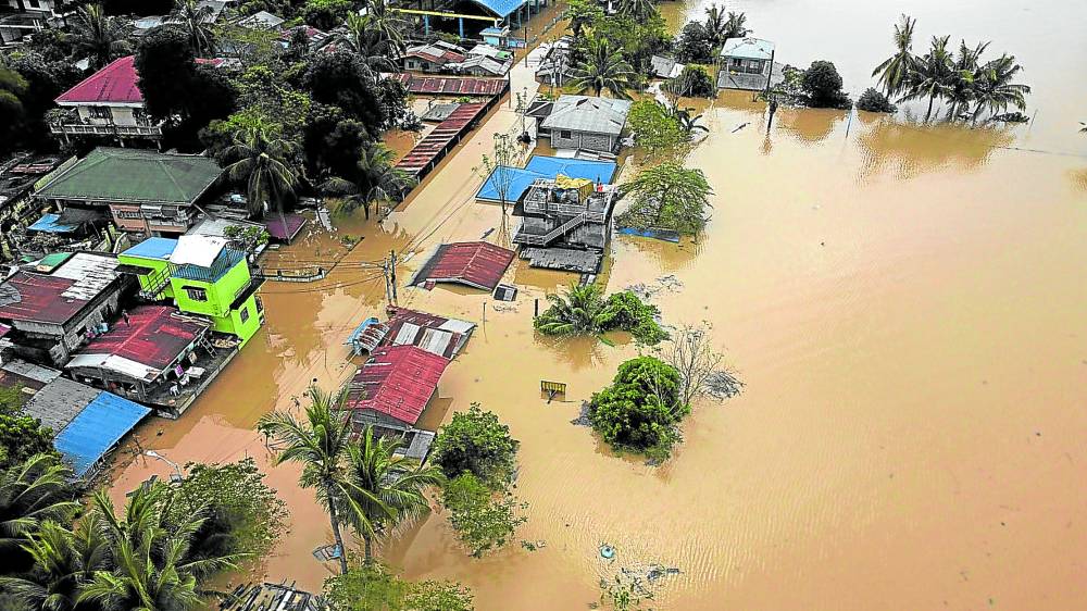 PHOTO: Aerial view of flooded area in Isabela FOR STORY: Study: Early aid eased 2024 PH storms’ impact